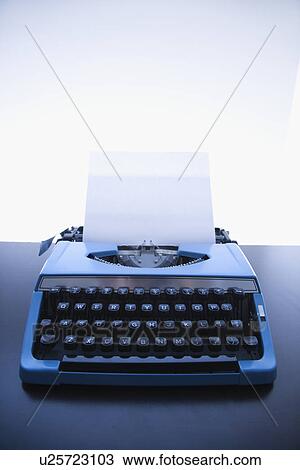 Blank sheet of paper in a typewriter View Large Photo Image Stock Image - Blank sheet of paper in a typewriter. Fotosearch