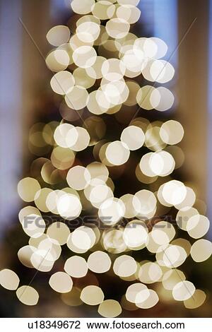Stock Image - Blurred abstract Christmas tree lights. Fotosearch
