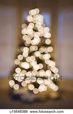 Stock Photo - Blurred abstract Christmas tree lights. Fotosearch