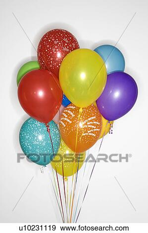 Bunch of colored helium balloons View Large Photo Image Stock Photo - Bunch of colored helium balloons. Fotosearch