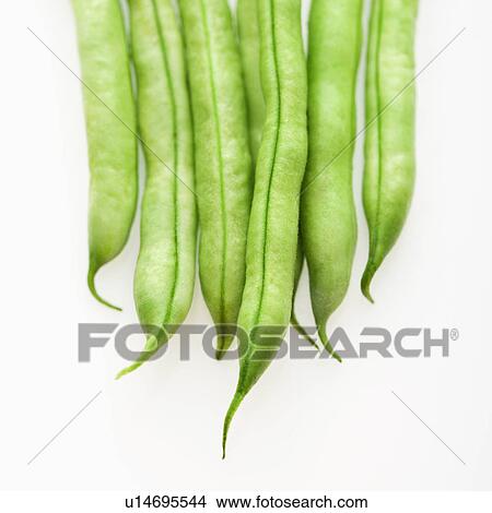 Picture - Close up of green beans on white background.. Fotosearch