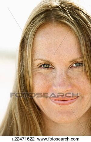 Close up portrait of attractive redheaded woman looking at viewer View Large Photo Image Stock Image - Close up portrait of attractive redheaded woman looking at viewer. Fotosearch
