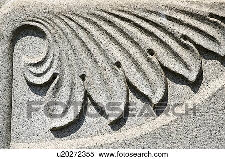 Stock Photography - Detail of gravestone in graveyard. Fotosearch