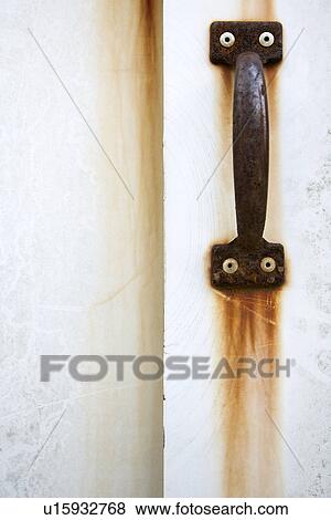 Stock Photo - Detail of rusted door handle. Fotosearch