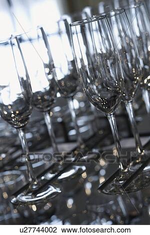 Stock Image - Empty glasses lined up. Fotosearch