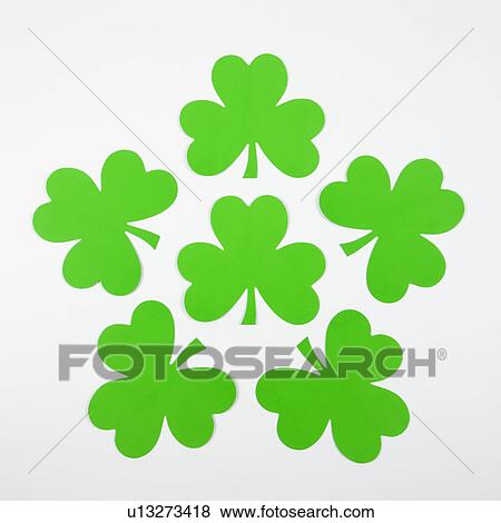 Group of green paper shamrocks arranged together View Large Photo Image Stock Photo - Group of green paper shamrocks arranged together. Fotosearch