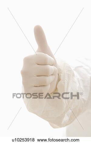Stock Photo - Hand wearing white rubber glove giving the thumbs up signal. Fotosearch