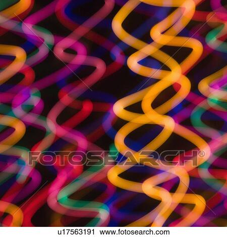 Multicolored lights forming abstract squiggle pattern from motion blur View Large Photo Image Stock Image - Multicolored lights forming abstract squiggle pattern from motion blur. Fotosearch