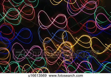Multicolored lights forming abstract squiggle pattern from motion blur View Large Photo Image Stock Photo - Multicolored lights forming abstract squiggle pattern from motion blur. Fotosearch