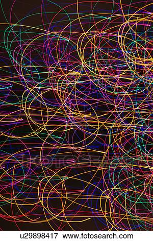 Multicolored lights forming abstract circular pattern from motion blur View Large Photo Image Stock Photo - Multicolored lights forming abstract circular pattern from motion blur. Fotosearch