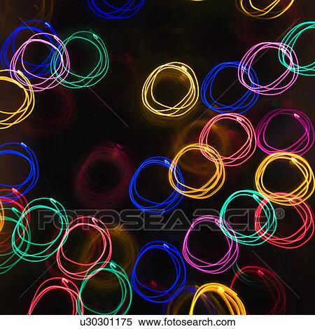 Multicolored lights forming abstract circle pattern from motion blur View Large Photo Image Stock Photography - Multicolored lights forming abstract circle pattern from motion blur. Fotosearch
