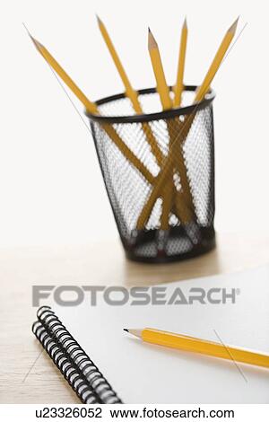Pencils and spiral bound notebooks arranged on a desk. View Large Photo Image Stock Image - Pencils and spiral bound notebooks arranged on a desk.. Fotosearch