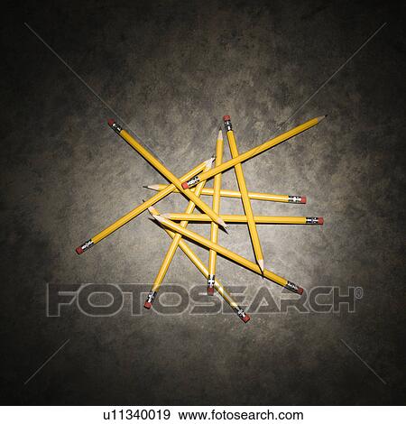 Pencils in a pile on textured background View Large Photo Image Stock Photo - Pencils in a pile on textured background. Fotosearch
