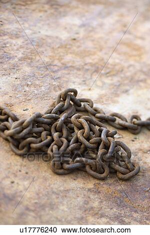 Pile of rusty chain on rusty metal View Large Photo Image Stock Image - Pile of rusty chain on rusty metal. Fotosearch
