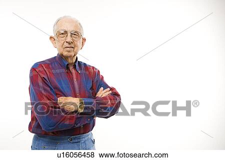 Portrait of an elderly man wearing plaid shirt with arms crossed View Large Photo Image Stock Photo - Portrait of an elderly man wearing plaid shirt with arms crossed. Fotosearch