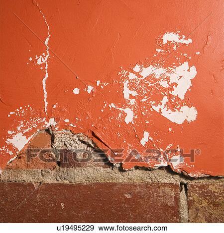 Red wall with cracking plaster and brick View Large Photo Image Stock Photo - Red wall with cracking plaster and brick. Fotosearch