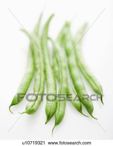 Selective focus shot of green beans on white background View Large Photo Image Stock Image - Selective focus shot of green beans on white background. Fotosearch