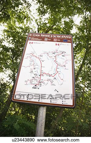 Stock Image - Sign with map showing routes in Tuscany, Italy. Fotosearch
