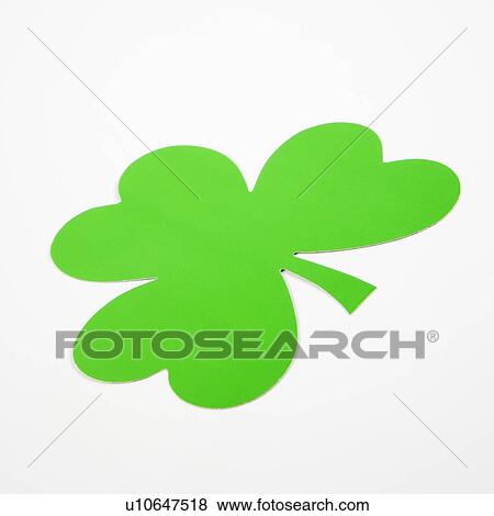 Stock Photo - Single green paper shamrock on white. Fotosearch