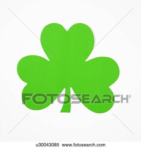 Stock Photography - Single green paper shamrock on white. Fotosearch
