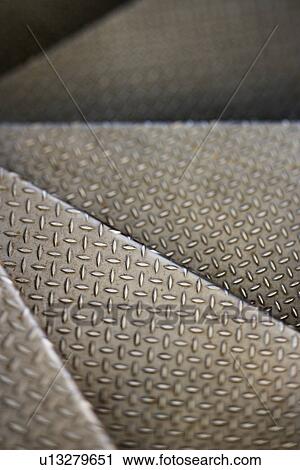 Spiral staircase of metal steps View Large Photo Image Stock Image - Spiral staircase of metal steps. Fotosearch
