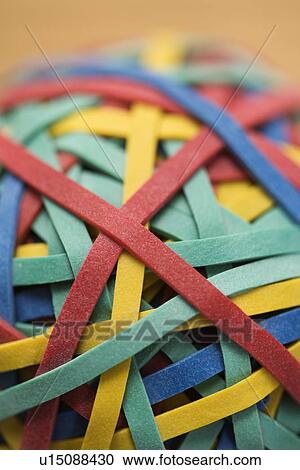 Stock Image - Still life of colorful rubber band ball. Fotosearch