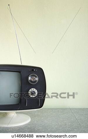 Still life of vintage television set with antenna raised. View Large Photo Image Stock Photo - Still life of vintage television set with antenna raised.. Fotosearch