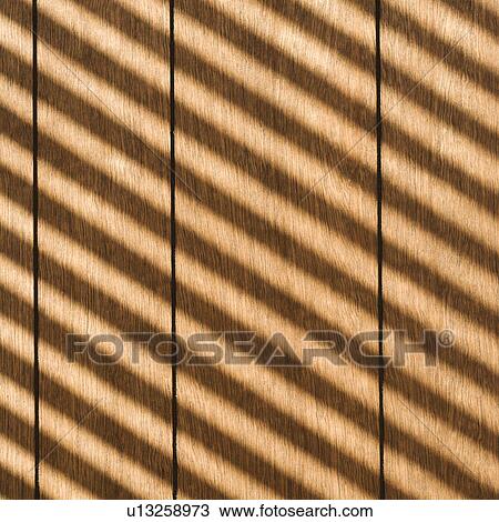 Sunlight reflecting diagonal stripes onto wood paneling View Large Photo Image Stock Image - Sunlight reflecting diagonal stripes onto wood paneling. Fotosearch