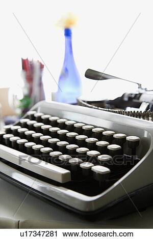 Typewriter sitting on counter View Large Photo Image Stock Image - Typewriter sitting on counter. Fotosearch