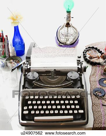 Typewriter with typed on paper sitting on counter View Large Photo Image Stock Image - Typewriter with typed on paper sitting on counter. Fotosearch