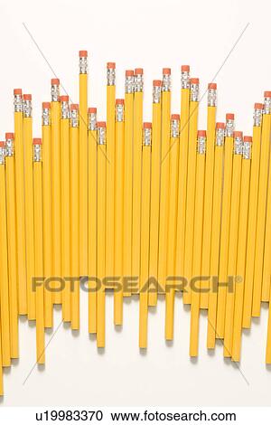 Uneven row of pencils. View Large Photo Image Stock Image - Uneven row of pencils.. Fotosearch