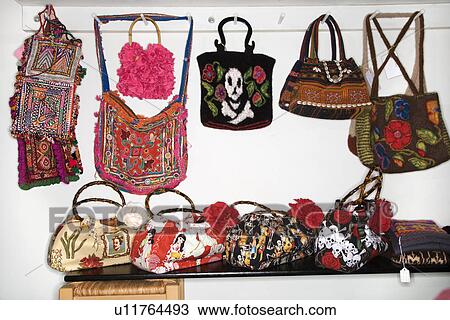 Stock Photo Of Unique Handbags Hanging In Retail U11764493 Stock Photo Unique Handbags Hanging In Retail Fotosearch Search Images