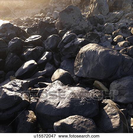 Variety of rocks on the coast of Hawaii View Large Photo Image Stock Photo - Variety of rocks on the coast of Hawaii. Fotosearch