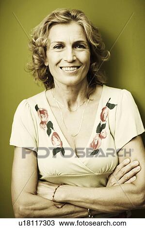 Close-up of a mature woman smiling View Large Photo Image Stock Image - Close-up of a mature woman smiling. Fotosearch