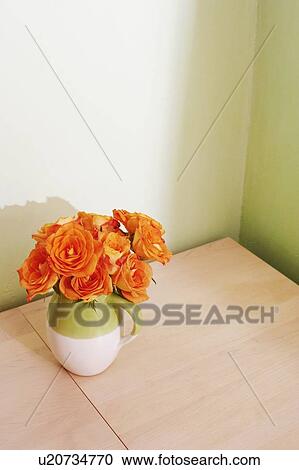 High angle view of roses in a jug View Large Photo Image Stock Image - High angle view of roses in a jug. Fotosearch