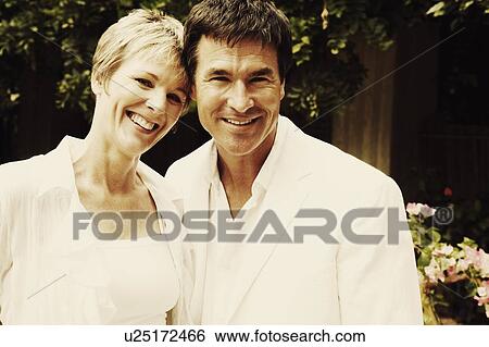 Portrait of a mature couple smiling View Large Photo Image Stock Photograph - Portrait of a mature couple smiling. Fotosearch
