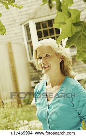 Picture - Portrait of a mature woman smiling. Fotosearch