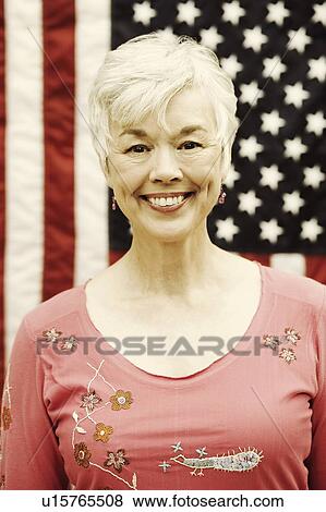 Portrait of a senior woman smiling View Large Photo Image Stock Photo - Portrait of a senior woman smiling. Fotosearch