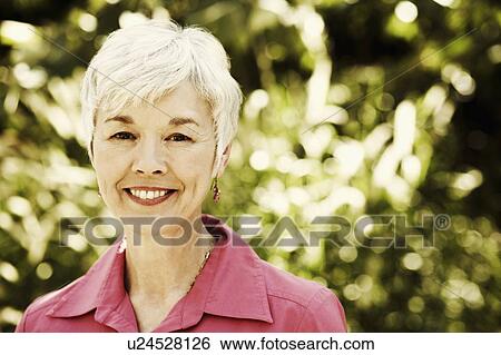 Stock Photograph - Portrait of a senior woman smiling. Fotosearch