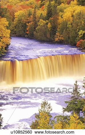 Stock Image - Waterfall in Autumn. Fotosearch