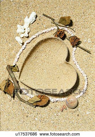 leaf, stone, branch, heart-shaped, rim, frame, sand View Large Photo Image Stock Photograph - leaf, stone, branch, heart-shaped, rim, frame, sand. Fotosearch