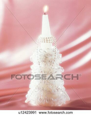 Stock Image - candlelight, glow, alight, heat, cylindrical, circular. Fotosearch