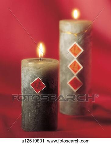 Stock Image - indoor, burning, candlelight. Fotosearch