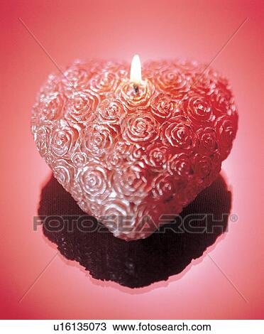 Stock Image - indoor, burning, candlelight. Fotosearch