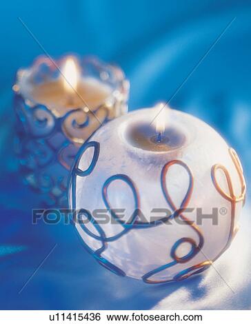 Stock Photograph - lit, round, candle, wick, piece. Fotosearch