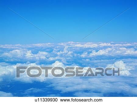 Stock Image - Cloudscapes, Day, Cluster, Nature, Natural Pattern, Fluffy, Formation. Fotosearch
