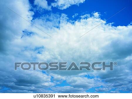 Stock Image - Weather, Blue, Overcast, Rain Cloud, Cloudscapes. Fotosearch