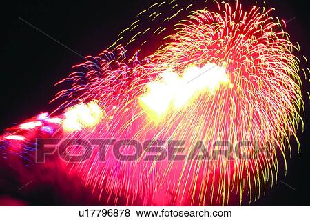 Stock Photo - Sparks, Celebration, Black Background, Darkness, Exploding, Display. Fotosearch
