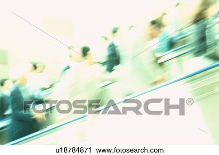 Stock Image - Commuters On Escalator. Fotosearch