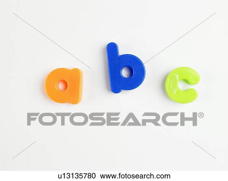 Stock Image - A B C' in magnetic letters (close-up). Fotosearch